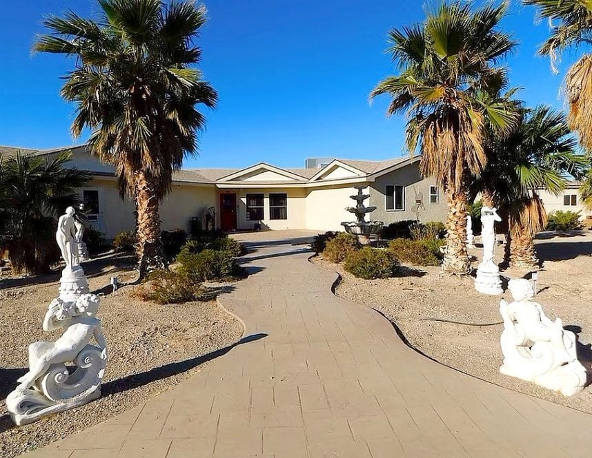 Desert house with decorative statuary