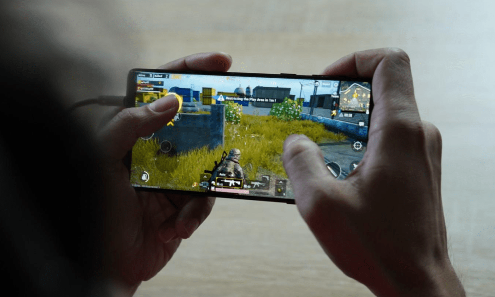 Person playing mobile game