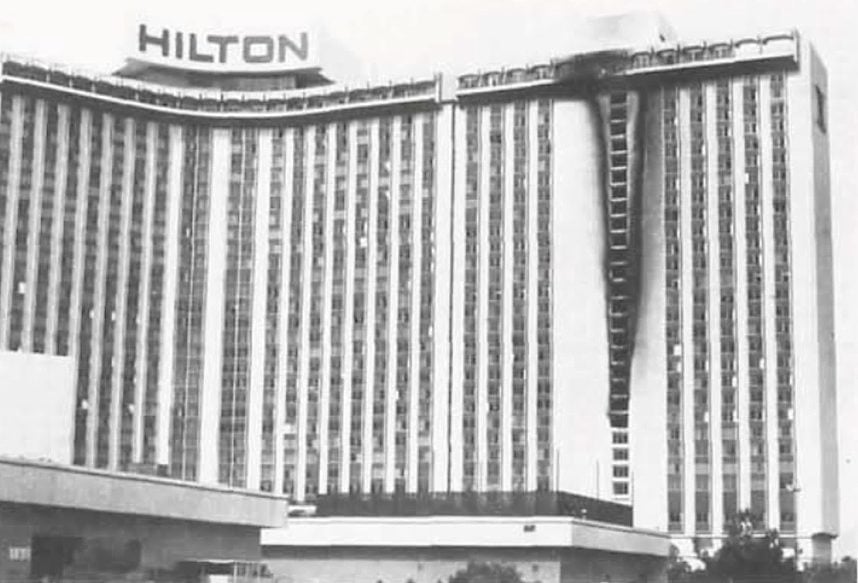 Hilton hotel with illuminated exterior signage