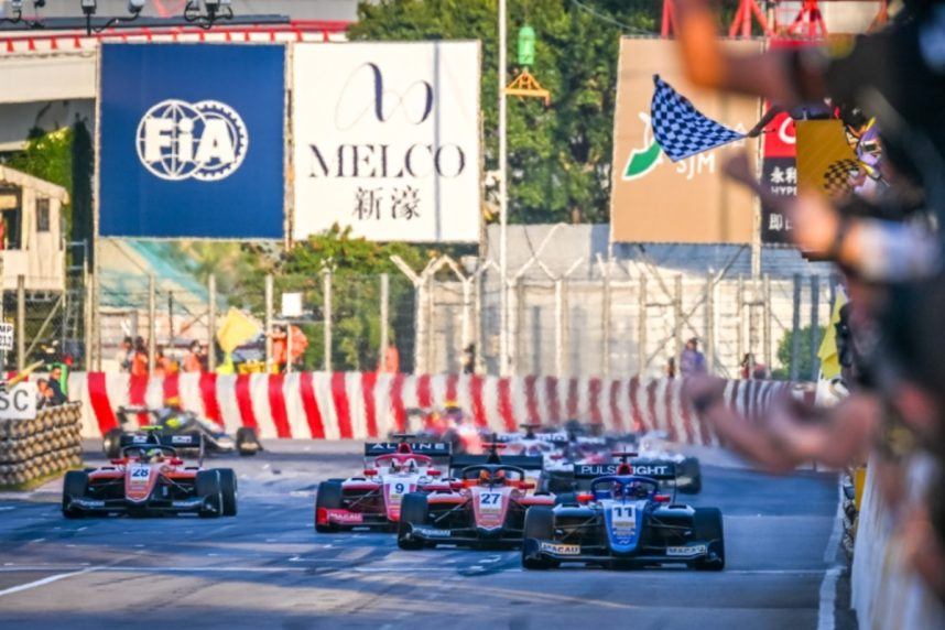 Formula race cars competing on track