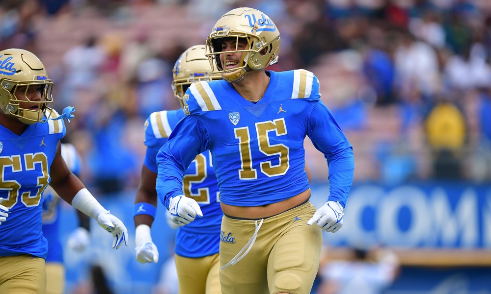 UCLA football players during game action