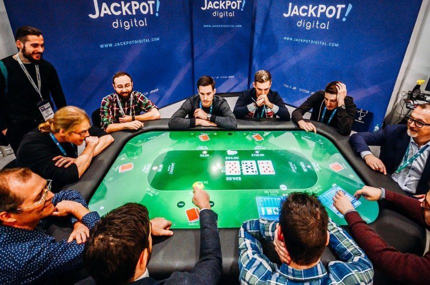 Men playing poker at casino table