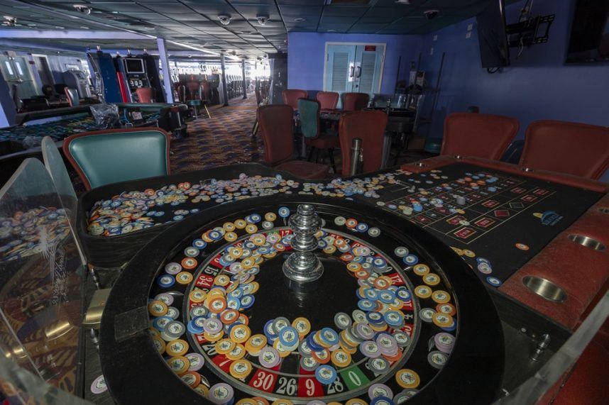 Casino chips scattered on roulette table