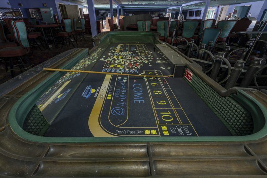 Casino craps table with players