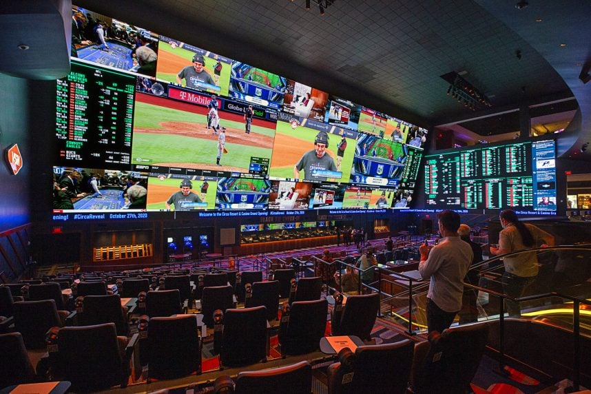 Crowd viewing sportsbook screens at Circa