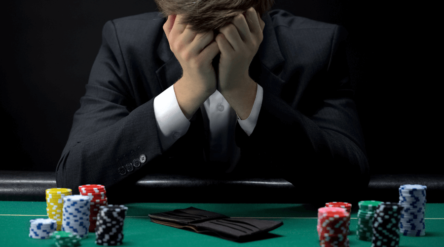 Man holding poker chips