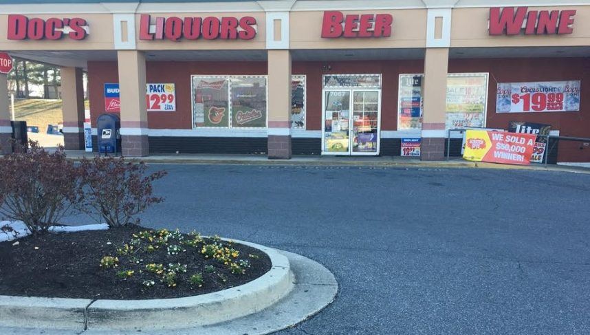 Small storefront with parking lot