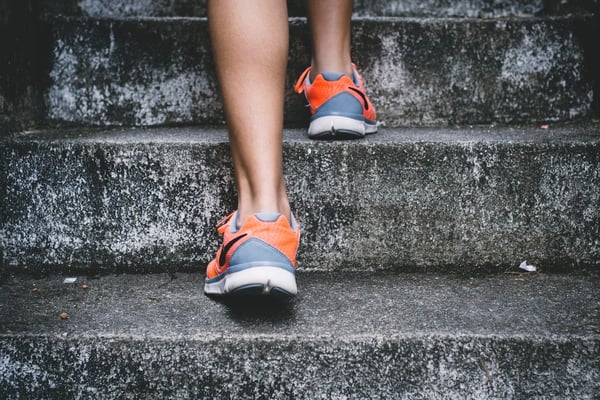 Athletic shoes on concrete stairs