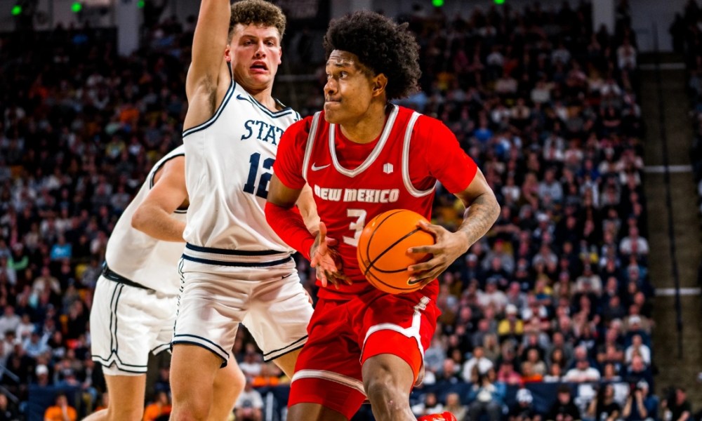 Lobos basketball player wearing red jersey